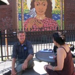 (Gazette Photo by David Taber) U.S. Senate candidate Tom Conroy speaks to JP resident Daria Casinelli at J.P. Licks at 659 Centre St. Aug. 30 during a stop on Conroy’s 650-mile walk around the state.