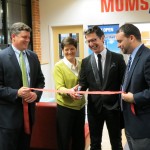 (Photo by Adam C. Webster/City Councilor John Connolly’s Office) Cutting the ribbon on the new MOMS Pharmacy at the AIDS Action Committee headquarters at 75 Amory St. on Feb. 28 are (from left) City Councilor John Connolly; AIDS Action President and CEO Rebecca Haag; David Richart of MOMS Pharmacy; and City Councilor and JP resident Felix Arroyo. The pharmacy specializes in HIV/AIDS medicine and joins a new drop-in social service center. For info, see aac.org.