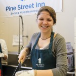 (Courtesy Photo) JP resident Kristina Zontini, who helps organize Project Bread’s annual Walk for Hunger, chops onions during volunteer work at the South End’s Pine Street Inn. This year’s Walk for Hunger will be May 6. For info, see projectbread.org.