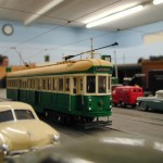 (Courtesy Photo) A 1/48 scale model trolley—about three inches tall—rolls along in the Bay State Model Railroad Museum’s large space.