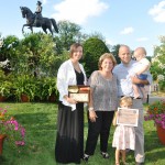 (Courtesy Photo) JP resident Jamie Day (right) and his children celebrates his third-place win in the porch/balcony category in Mayor Menino’s 2012 Garden Contest, along with (from left) winner Kimberly Roberts of East Boston and Angela Menino, wife of the mayor, at the Public Garden on Aug. 28. Other JP winners included Myrna Balk (first place, senior garden) and Walter Janulewicz and Tim Otte (third place, large yard garden).