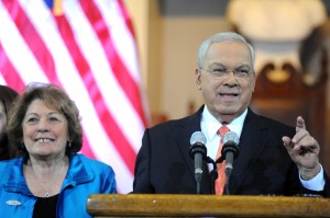 (Photo Courtesy Mayor’s Office) Mayor Thomas Menino, with wife Angela at his side, announces he will not run for reelection at Faneuil Hall on March 28.
