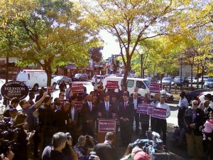John Barros (left) and Felix Arroyo (right) endorse Marty Walsh (center). (Gazette Photo by Peter Shanley)