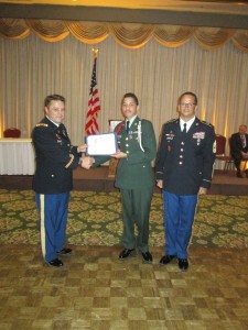 English High School Army JROTC Cadet Carlos Menchaca (center) receives the Superior Cadet Award from Command Sgt. Maj. Charles Hornbuckle (left) and Lt. Col. David Bennett (right) at the school’s alumni banquet and awards ceremony Oct. 24 at The Lantana in Randolph. (Courtesy Photo)