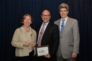 Local state Rep. Jeffrey Sánchez (center) accepts an honor for his work with the Early Education and Out of School Time Capital Fund from Mav Pardee (left), Children’s Investment Fund program manager, and Roger Herzog (right), executive director of Community Economic Development Assistance Corporation, on Feb. 4 at Blue Cross Blue Shield of Massachusetts in the Fenway. The new fund will provide capital to improve facilities that offer care to children from low-income families. (Courtesy Photo)