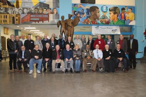 Members of the English High School Class of 1966 came together for a 50th reunion at the school on Dec. 16. A dinner followed at Doyle’s Cafe across the street. Current headmaster Ligia Noriega-Murphy welcomed the grads and joined the class for a group photo in the school lobby. Courtesy Photo by Patrick O’Connor