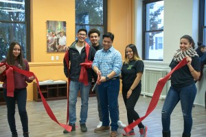 The Hyde Square Task Force (HSTF) hosted a grand reopening event at its newly renovated Youth Development Center. The renovation of the 100-year-old Cheverus building on the Blessed Sacrament campus cost $2.5 million. Pictured are HSTF youth leaders, including Jonathan Vo cutting the celebratory ribbon. Courtesy Photo